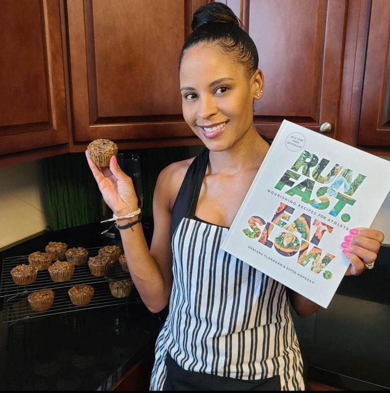 Woman baking muffins from Run Fast Eat Slow recipe book for runners. 