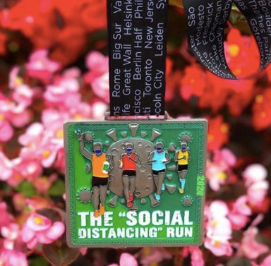 Medal from the Social Distancing Run 5k during pandemic of 2020. 